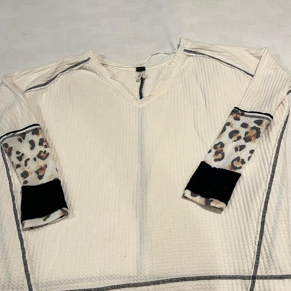 We the free oversized creme top/ animal print sleeves